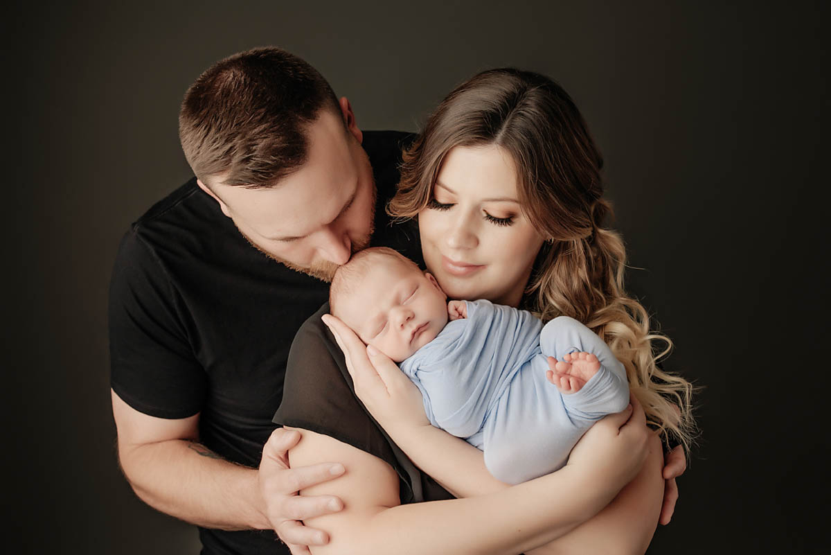 Capturing Precious Moments: Ensuring Safety in Newborn Photography with Akron Newborn Photographer.