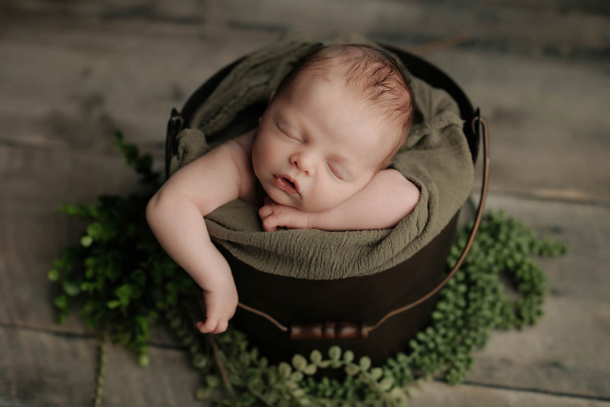 Capturing Precious Moments: Ensuring Safety in Newborn Photography with Akron Newborn Photographer.